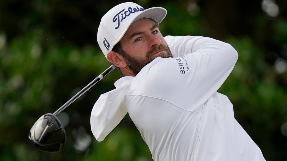 Cameron Young of the US plays from the 3rd tee during the first round of the British Open golf championship on the Old Course at St. Andrews, Scotland, Thursday, July 14 2022. The Open Championship returns to the home of golf on July 14-17, 2022, to 