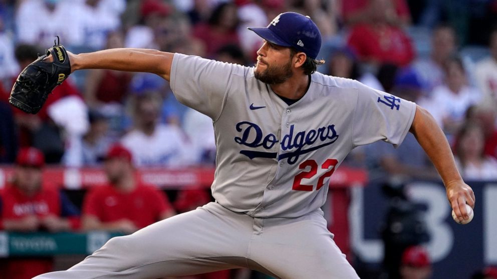 Los Angeles Dodgers starting pitcher Clayton Kershaw throws to the plate during the second inning of a baseball game against the Los Angeles Angels Friday, July 15, 2022, in Anaheim, Calif. (AP Photo/Mark J. Terrill)