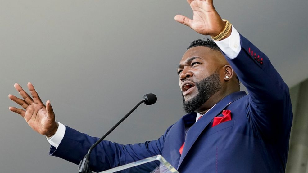 Hall of Fame inductee David Ortiz, formerly of the Boston Red Sox baseball team, speaks during the National Baseball Hall of Fame induction ceremony, Sunday, July 24, 2022, in Cooperstown, N.Y. (AP Photo/John Minchillo)