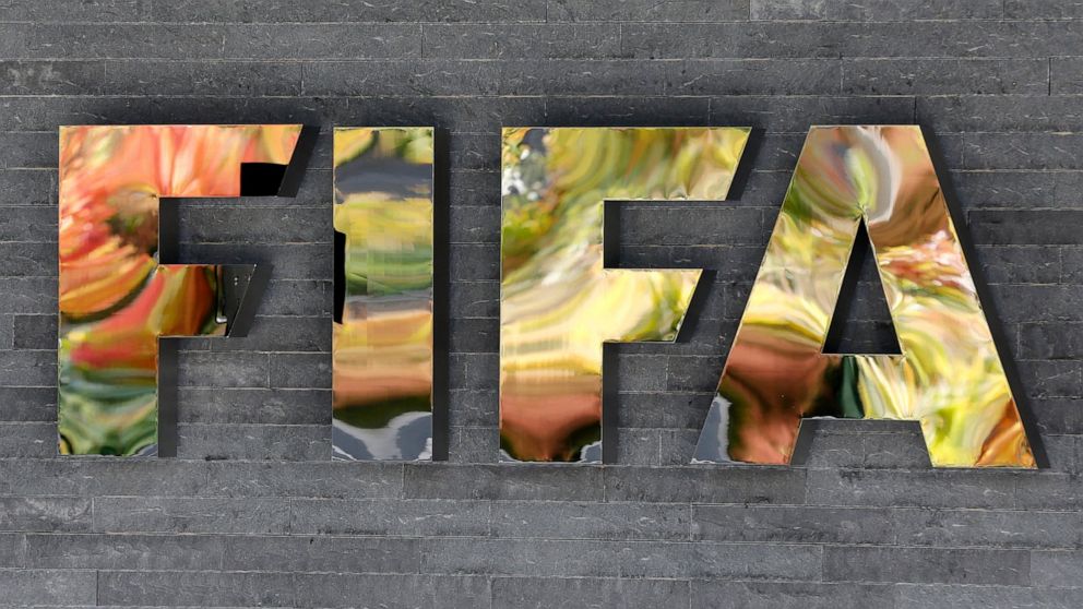FILE - in this Sept. 25, 2015 file photo, the International Federation of Association Football, FIFA, logo is fixed on a wall of its headquarters during a meeting of the FIFA Executive Committee in Zurich, Switzerland. Reynaldo Vasquez, the former pr