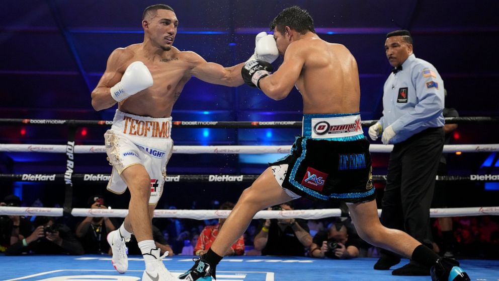 Teofimo Lopez hits Pedro Campa in a junior welterweight boxing match, Saturday, Aug. 13, 2022, in Las Vegas. (AP Photo/John Locher)