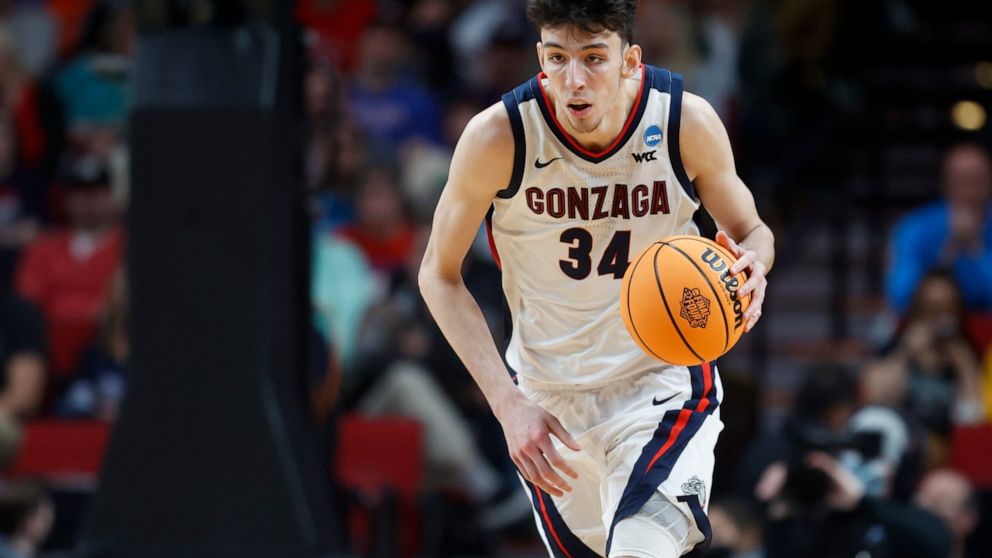 FILE - Gonzaga center Chet Holmgren brings the ball up against Georgia State during the second half of a first-round NCAA college basketball tournament game March 17, 2022, in Portland, Ore. Holmgren is one of the top forwards in the upcoming NBA dra