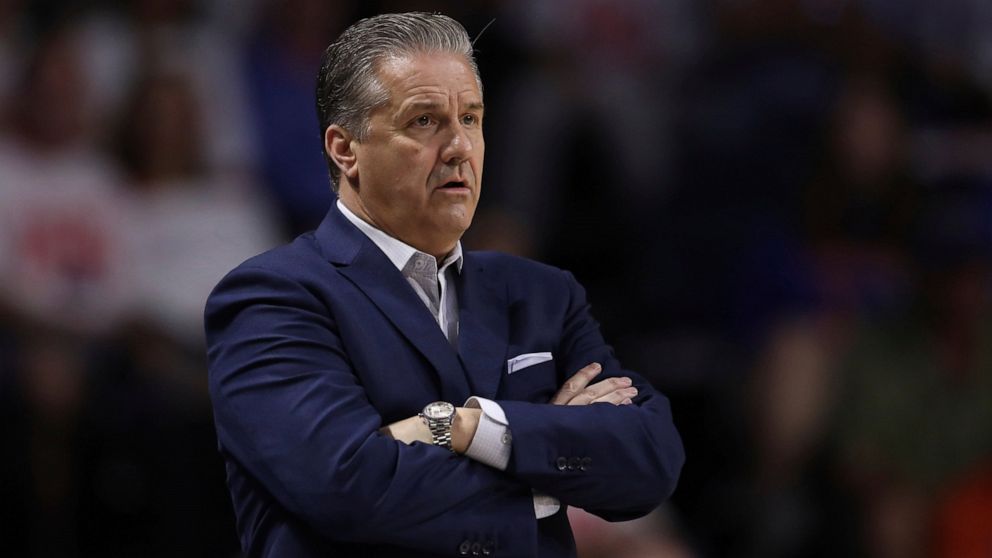 University of Kentucky men’s basketball head coach John Calipari stands on the sidelines during the first half of the team's NCAA college basketball game against Florida, Saturday, March 5, 2022, in Gainesville, Fla. University police have arrested a