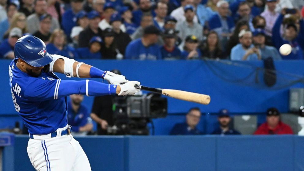 Toronto Blue Jays designated hitter Lourdes Gurriel Jr. hits a double in the fifth inning of a baseball game against the Baltimore Orioles in Toronto, Monday, June 13, 2022. (Jon Blacker/The Canadian Press via AP)