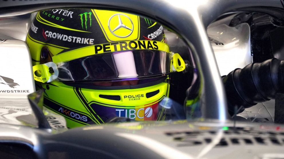 Mercedes driver Lewis Hamilton of Britain waits on his car in the pit garage during the first free practice for the Austrian Formula One Grand Prix at the Red Bull Ring racetrack in Spielberg, Austria, Friday, July 8, 2022. The Austrian F1 Grand Prix
