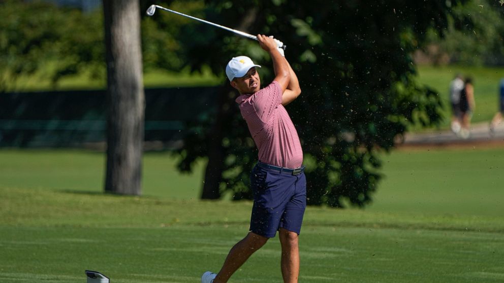 Xander Schauffele hits off the 13th tee during practice for the Presidents Cup golf tournament at the Quail Hollow Club, Tuesday, Sept. 20, 2022, in Charlotte, N.C. (AP Photo/Chris Carlson)