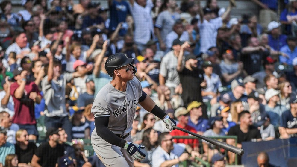 New York Yankees' Aaron Judge looks up after hitting his 59th home run during the seventh inning of a baseball game against the Milwaukee Brewers, Sunday, Sept. 18, 2022, in Milwaukee. (AP Photo/Kenny Yoo)