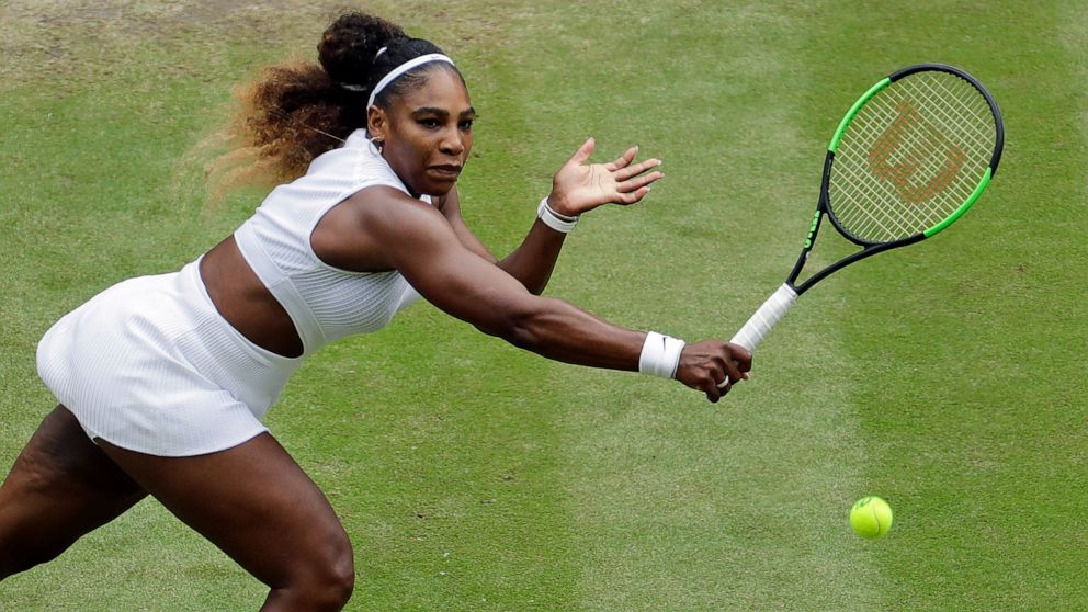 United States' Serena Williams returns to United States' Alison Riske in a Women's quarterfinal singles match on day eight of the Wimbledon Tennis Championships in London, Tuesday, July 9, 2019. (AP Photo/Ben Curtis)