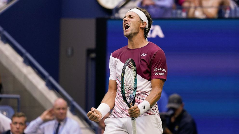 Casper Ruud, of Norway, reacts after defeating Karen Khachanov, of Russia, during the semifinals of the U.S. Open tennis championships, Friday, Sept. 9, 2022, in New York. (AP Photo/Charles Krupa)