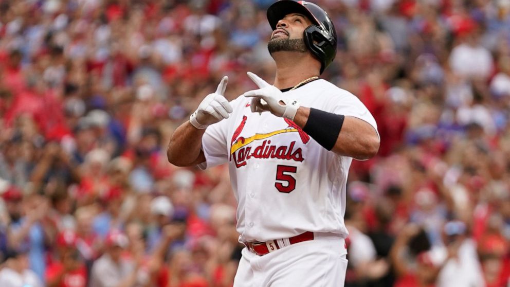 St. Louis Cardinals' Albert Pujols celebrates after hitting a two-run home run during the eighth inning of a baseball game against the Chicago Cubs Sunday, Sept. 4, 2022, in St. Louis. (AP Photo/Jeff Roberson)