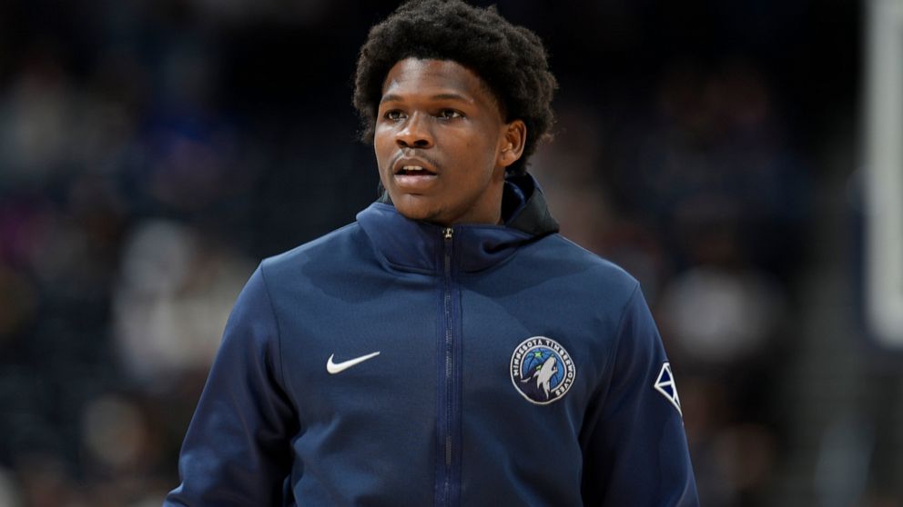 FILE - Minnesota Timberwolves forward Anthony Edwards is shown at an NBA basketball game Friday, April 1, 2022, in Denver. Timberwolves guard Anthony Edwards was fined $40,000 by the NBA on Tuesday, Sept. 20, 2022, for homophobic comments he made on 