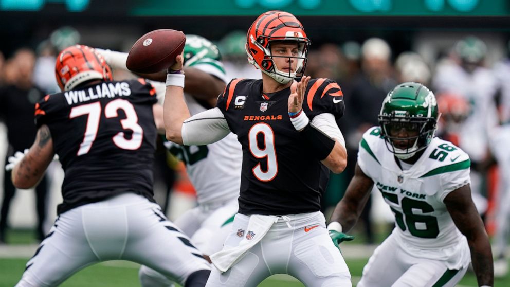 Cincinnati Bengals quarterback Joe Burrow looks to throw a pass during the first half of an NFL football game New York Jets, Sunday, Sept. 25, 2022, in East Rutherford, N.J. (AP Photo/Seth Wenig)