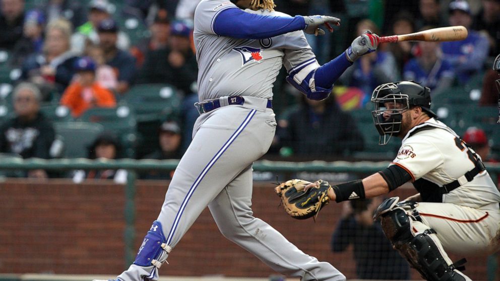 Toronto Blue Jays' Vladimir Guerrero Jr. hits a single against the San Francisco Giants during the second inning of a baseball game in San Francisco, Tuesday, May 14, 2019. (AP Photo/Tony Avelar)