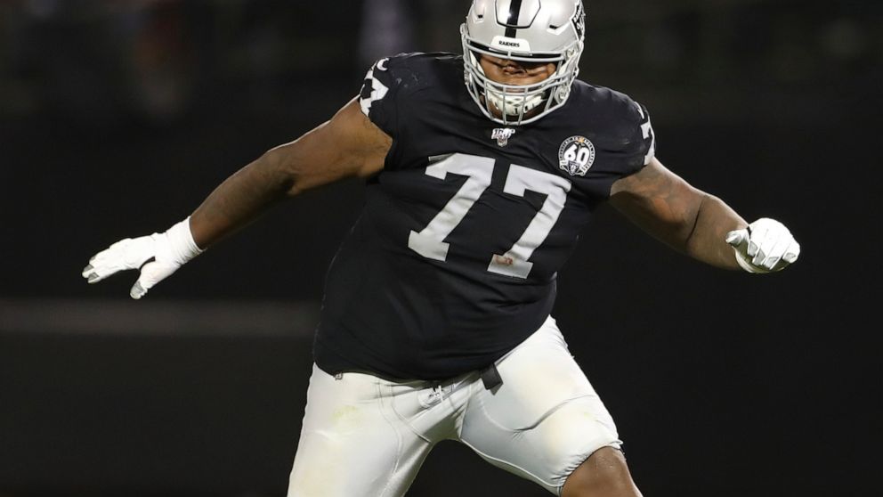 FILE - In this Sept. 9, 2019, file photo, Oakland Raiders offensive tackle Trent Brown (77) protects a gap in the offensive line during an NFL football game against the Denver Broncos, in Oakland, Calif. The Las Vegas Raiders sent all five starting o