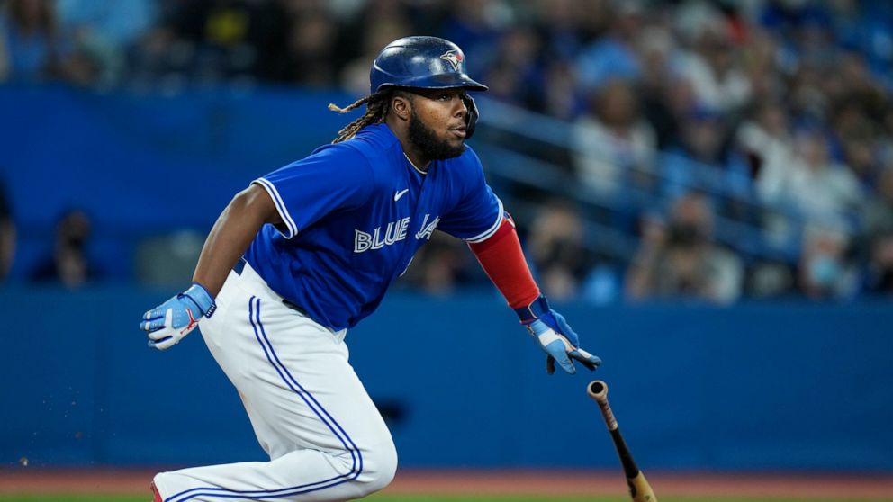 Toronto Blue Jays designated hitter Vladimir Guerrero Jr. (27) hits an infield ground out against the Boston Red Sox during the fifth inning of a baseball game, Tuesday, April 26, 2022 in Toronto. (Nathan Denette/The Canadian Press via AP)