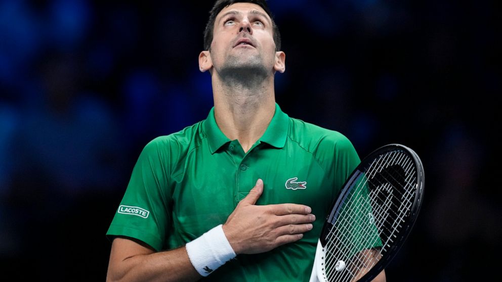 Serbia's Novak Djokovic celebrates after winning against Russia's Andrej Rublev during their singles tennis match of the ATP World Tour Finals, at the Pala Alpitour in Turin, Italy, Wednesday, Nov. 16, 2022. (AP Photo/Antonio Calanni)