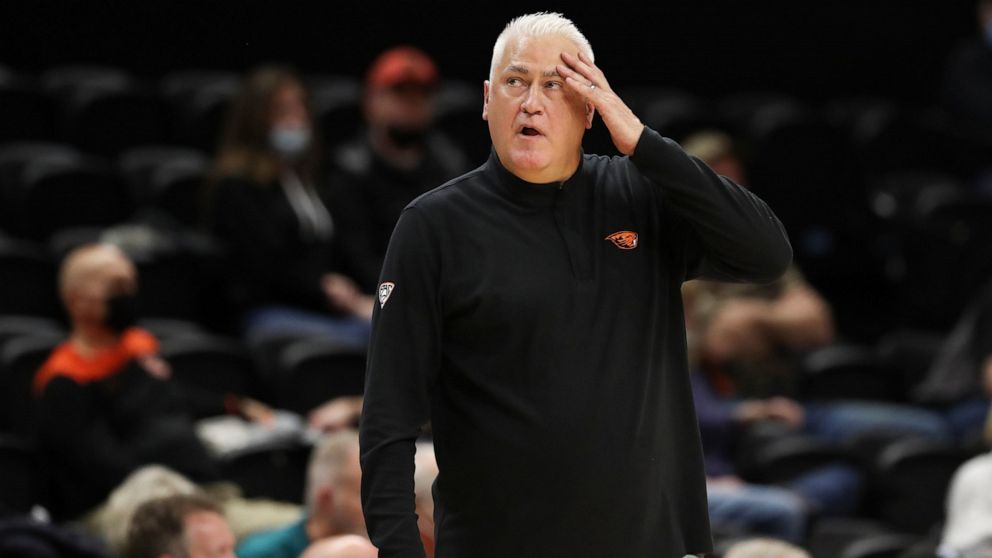 Oregon State coach Wayne Tinkle looks at the scoreboard at the start of a timeout during the second half of the team's NCAA college basketball game against California on Wednesday, Feb. 9, 2022, in Corvallis, Ore. California won 63-61. (AP Photo/Aman