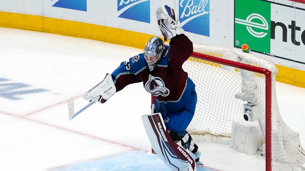 Colorado Avalanche goaltender Darcy Kuemper celebrates the team's 2-1 overtime win against the Nashville Predators in Game 2 of an NHL hockey Stanley Cup first-round playoff series Thursday, May 5, 2022, in Denver. (AP Photo/Jack Dempsey)