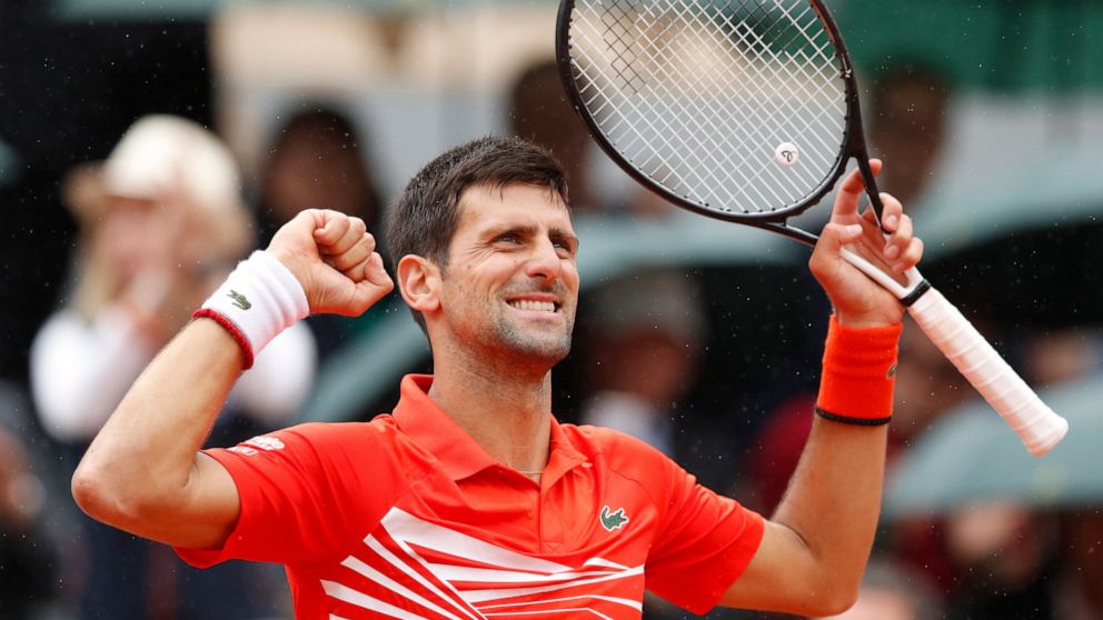 Serbia's Novak Djokovic celebrates winning his fourth round match of the French Open tennis tournament against Germany's Jan-Lennard Struff in three sets, 6-3, 6-2, 6-2, at the Roland Garros stadium in Paris, Monday, June 3, 2019. (AP Photo/Christoph