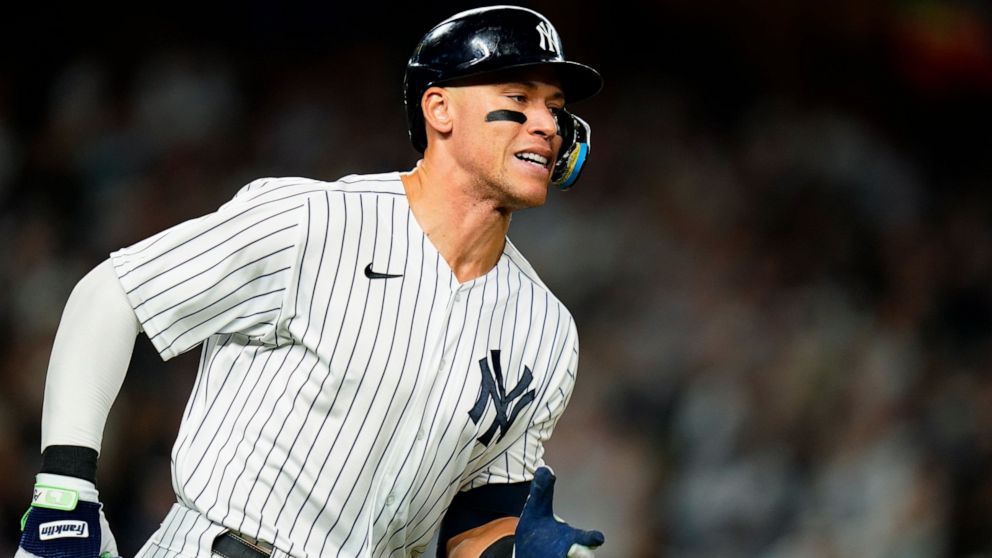 New York Yankees' Aaron Judge runs to second base on a double during the first inning of the team's baseball game against the Pittsburgh Pirates on Wednesday, Sept. 21, 2022, in New York. (AP Photo/Frank Franklin II)