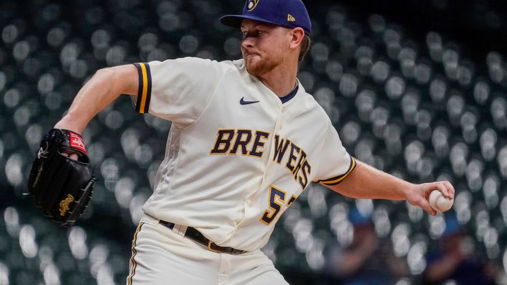 Milwaukee Brewers starting pitcher Eric Lauer throws during the first inning of a baseball game against the Arizona Diamondbacks Tuesday, Oct. 4, 2022, in Milwaukee. (AP Photo/Morry Gash)