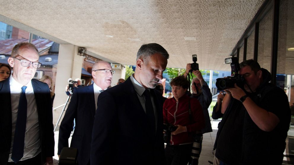 Former Manchester United footballer Ryan Giggs arrives at Manchester Crown Court in Manchester, England, Friday, Aug. 19, 2022. Giggs is on trial on charges of assault and use of coercive behavior against ex-girlfriend Kate Greville. Giggs is also ch