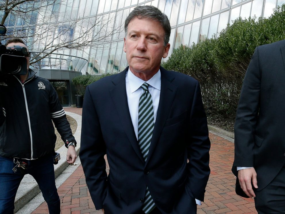 Bruce Isackson departs federal court in Boston on Wednesday, April 3, 2019, after facing charges in a nationwide college admissions bribery scandal.