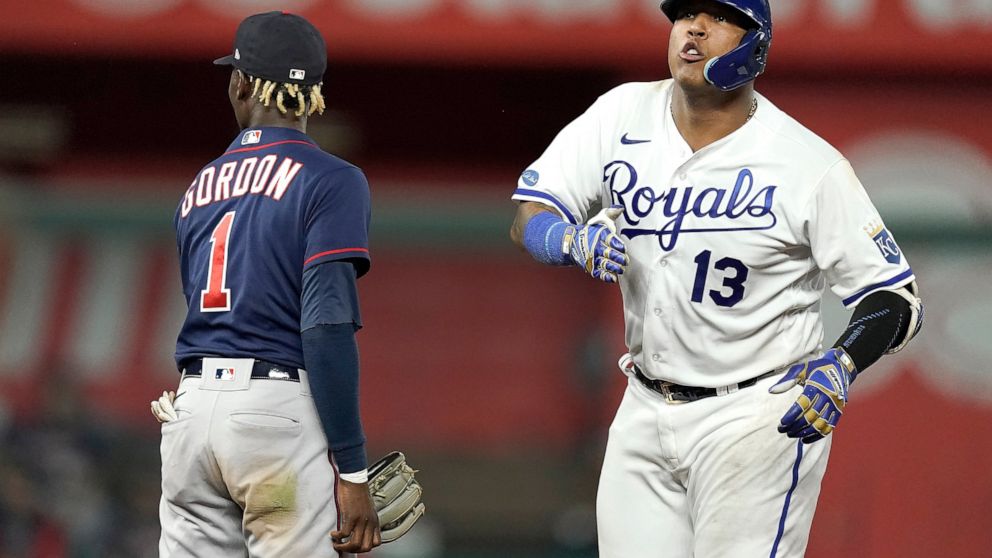 Kansas City Royals' Salvador Perez (13) celebrates on second after hitting an RBI double during the seventh inning of a baseball game against the Minnesota Twins Tuesday, Sept. 20, 2022, in Kansas City, Mo. (AP Photo/Charlie Riedel)