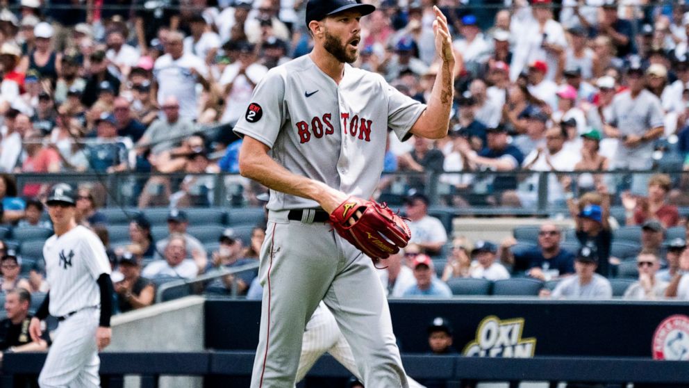 Boston Red Sox starting pitcher Chris Sale walks off the mound after a hand injury during the second inning of a baseball game against the New York Yankees, Sunday, July 17, 2022, in New York. (AP Photo/Julia Nikhinson)
