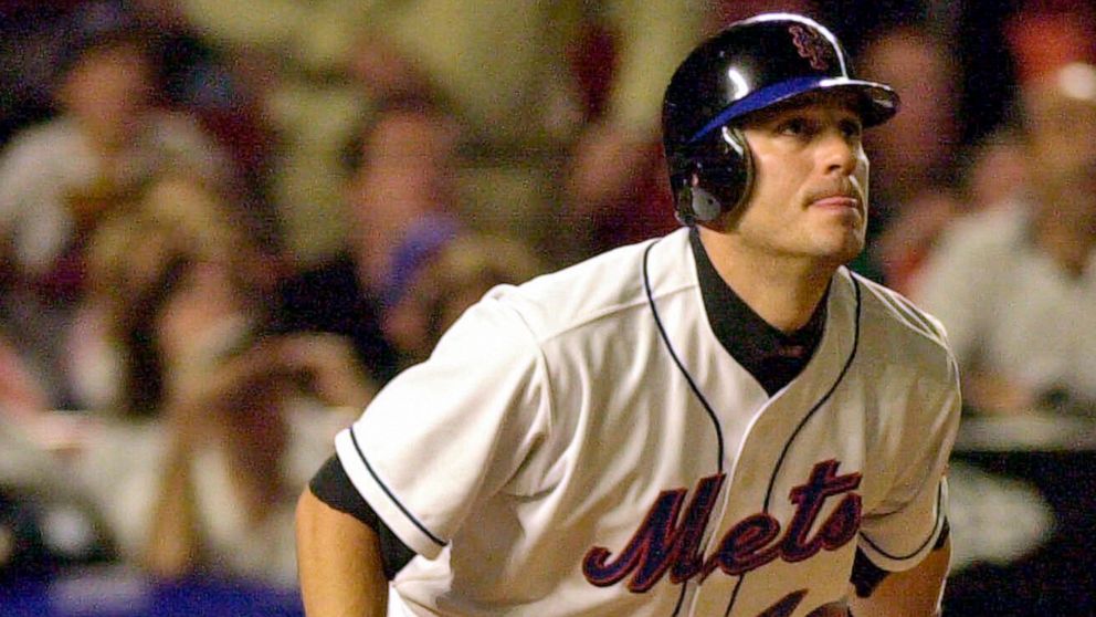 FILE - New York Mets Robin Ventura watches the path of his grand slam hit off Houston Astros pitcher Jay Powell in the seventh inning of a baseball game on May 1, 2001, at Shea Stadium in New York. The Mets announced Tuesday, Feb. 8, 2022, the return