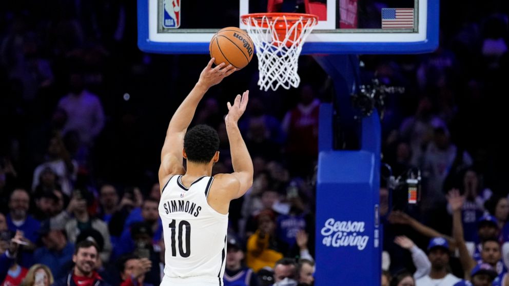 Brooklyn Nets' Ben Simmons shoots a free-throw during the first half of an NBA basketball game against the Philadelphia 76ers, Tuesday, Nov. 22, 2022, in Philadelphia. (AP Photo/Matt Slocum)
