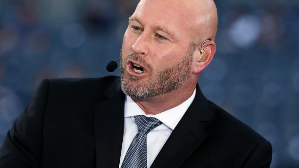 FILE - Trent Dilfer talks during ESPN's Monday Night Countdown before an NFL football game between the Chicago Bears and the Philadelphia Eagles, Sept. 19, 2016, in Chicago. Dilfer, who has been coaching a high school team in Tennessee for the last f