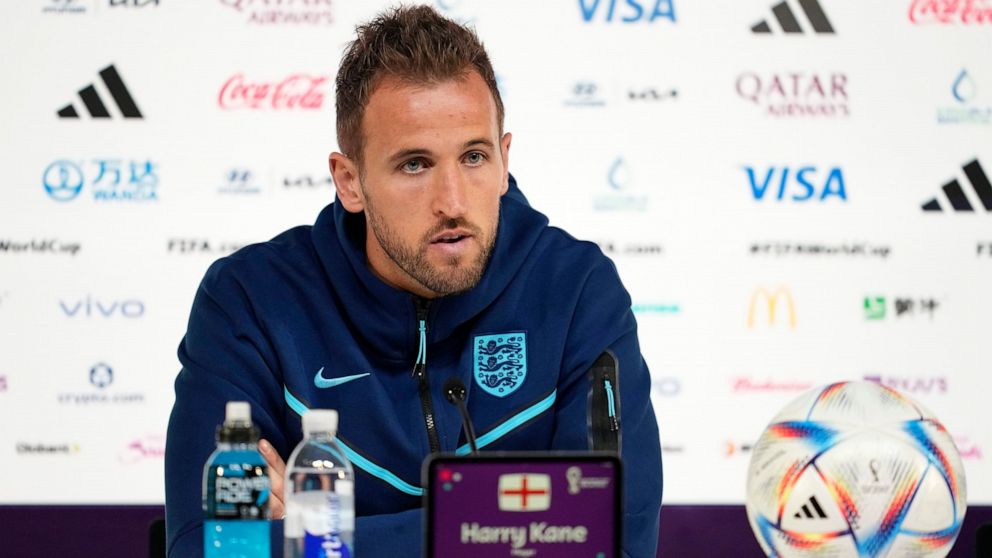 England forward Harry Kane speaks to the media during a press conference at the Qatar National Convention Center on the eve of the group B World Cup soccer match between England and Iran, in Doha, Qatar, Sunday, Nov. 20, 2022. (AP Photo/Abbie Parr)