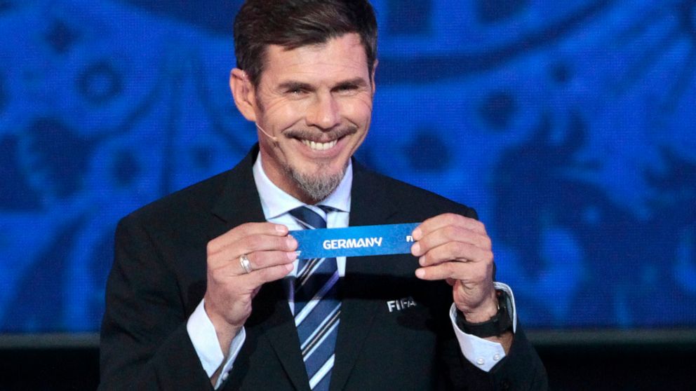 FILE - In this Saturday, Nov. 26, 2016 file photo, Zvonimir Boban, FIFA's Deputy Secretary General for Football, holds the lot of Germany during the draw for the soccer Confederations Cup 2017, in Kazan, Russia. FIFA presidential adviser Zvonimir Bob