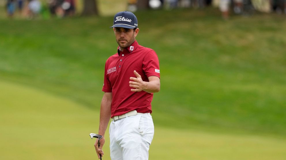 Callum Tarren, of England, reacts after a putt on the ninth hole during the first round of the U.S. Open golf tournament at The Country Club, Thursday, June 16, 2022, in Brookline, Mass. (AP Photo/Charlie Riedel)