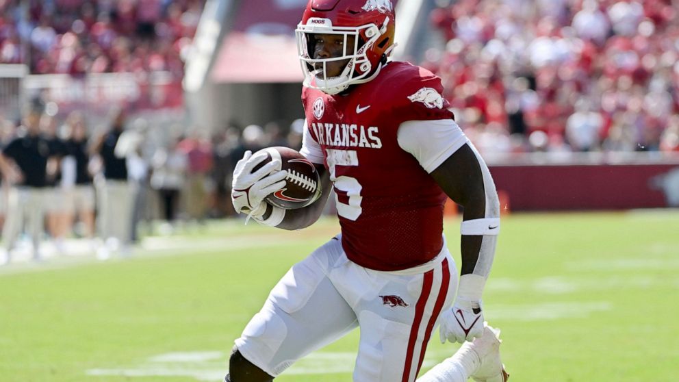 Arkansas running back Raheim Sanders (5) runs for a touchdown against South Carolina during the first half of an NCAA college football game Saturday, Sept. 10, 2022, in Fayetteville, Ark. (AP Photo/Michael Woods)