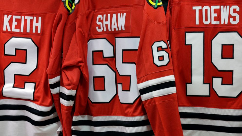 FILE - In this May 28, 2014, file photo, Chicago Blackhawks jerseys are displayed at a store inside of the United Center at Game 5 of the Western Conference finals in the NHL hockey Stanley Cup playoffs between the Blackhawks and the Los Angeles King