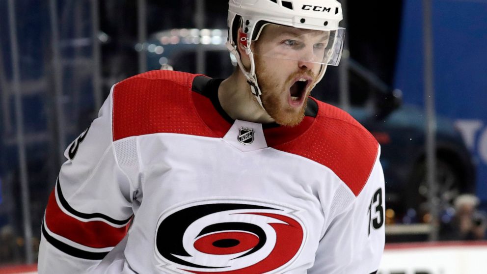 Carolina Hurricanes left wing Warren Foegele reacts after scoring a goal against the New York Islanders during the third period of Game 2 of an NHL hockey second-round playoff series, Sunday, April 28, 2019, in New York. (AP Photo/Julio Cortez)