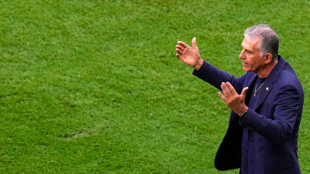 Iran's head coach Carlos Queiroz reacts during the World Cup group B soccer match between Wales and Iran, at the Ahmad Bin Ali Stadium in Al Rayyan , Qatar, Friday, Nov. 25, 2022. (AP Photo/Manu Fernandez)