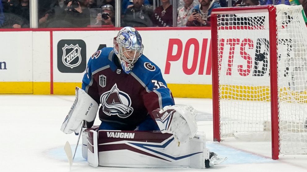 Colorado Avalanche goaltender Darcy Kuemper (35) gives up a goal to the Tampa Bay Lightning during the second period of Game 1 of the NHL hockey Stanley Cup Final on Wednesday, June 15, 2022, in Denver. (AP Photo/John Locher)