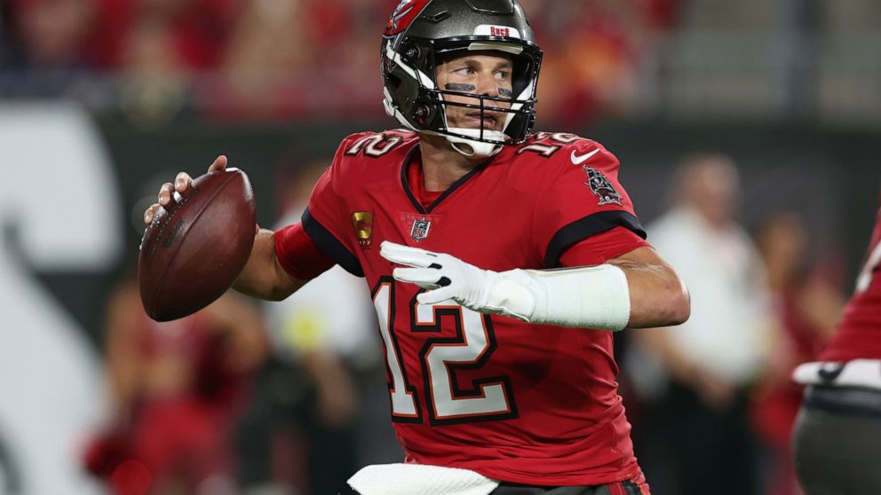 Tampa Bay Buccaneers quarterback Tom Brady (12) drops back to pass in the first half of an NFL football game against the New Orleans Saints in Tampa, Fla., Monday, Dec. 5, 2022. (AP Photo/Mark LoMoglio)