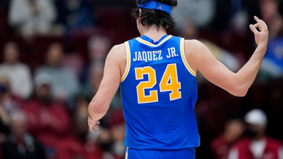 UCLA guard Jaime Jaquez Jr. reacts after scoring a 3-point basket against Stanford during the first half of an NCAA college basketball game in Stanford, Calif., Thursday, Dec. 1, 2022. (AP Photo/Godofredo A. Vásquez)