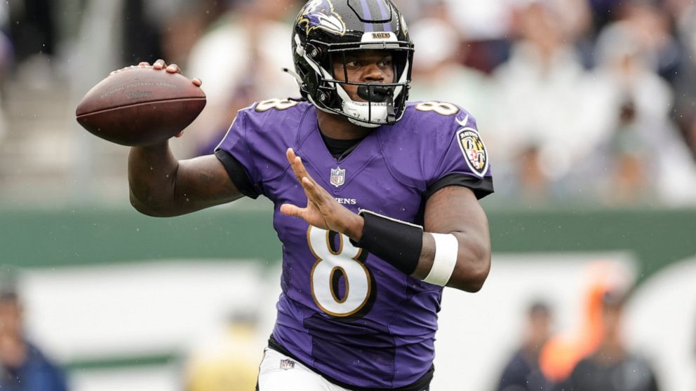 Baltimore Ravens quarterback Lamar Jackson (8) looks to throw a pass during the first half of an NFL football game against the New York Jets, Sunday, Sept. 11, 2022, in East Rutherford, N.J. (AP Photo/Adam Hunger)