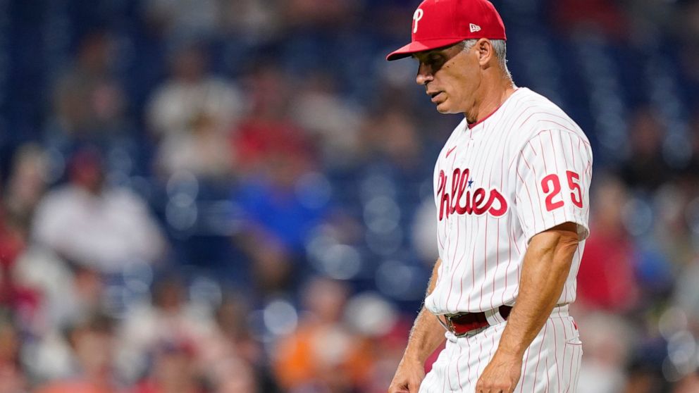 FILE - Philadelphia Phillies' Joe Girardi walks to the dugout during a baseball game, Tuesday, May 31, 2022, in Philadelphia. Joe Girardi was fired by the Philadelphia Phillies on Friday, June 3, 2022, after his team's terrible start, becoming the fi