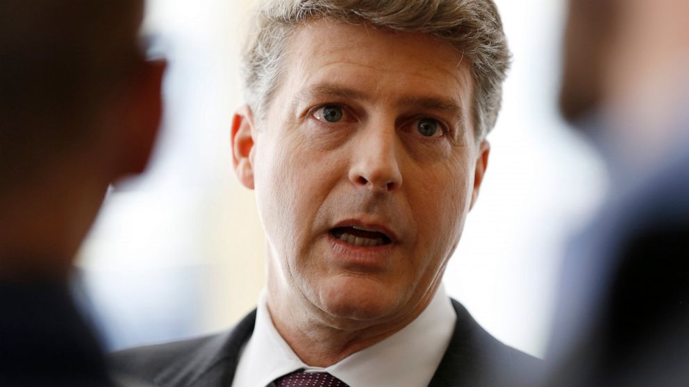 FILE - New York Yankees owner Hal Steinbrenner stops to talk to the media before attending a meeting of Major League Baseball's executive committee on May 18, 2016, in New York. Steinbrenner realizes there is a chance the price may be going up to sig
