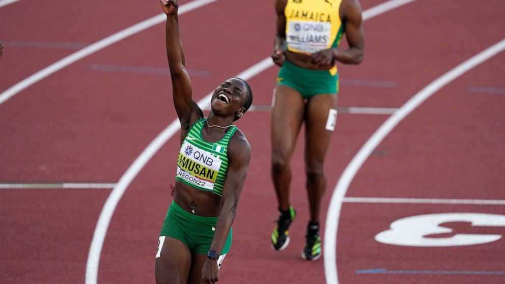 Tobi Amusan, of Nigeria, celebrates winning the women's 100-meter hurdles final at the World Athletics Championships on Sunday, July 24, 2022, in Eugene, Ore. (AP Photo/Gregory Bull)