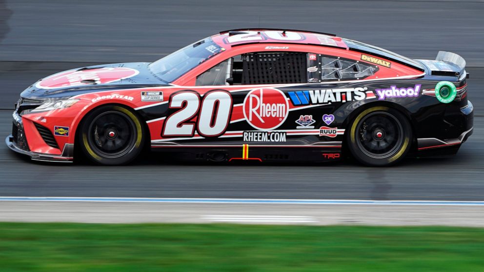 Christopher Bell steers into Turn 4 during a NASCAR Cup Series auto race at the New Hampshire Motor Speedway, Sunday, July 17, 2022, in Loudon, N.H. (AP Photo/Charles Krupa)