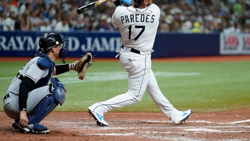 Tampa Bay Rays' Isaac Paredes (17) watches his two-run home run off New York Yankees' Clarke Schmidt during the fifth inning of a baseball game Tuesday, June 21, 2022, in St. Petersburg, Fla. Catching for New York is Kyle Higashioka. (AP Photo/Chris 