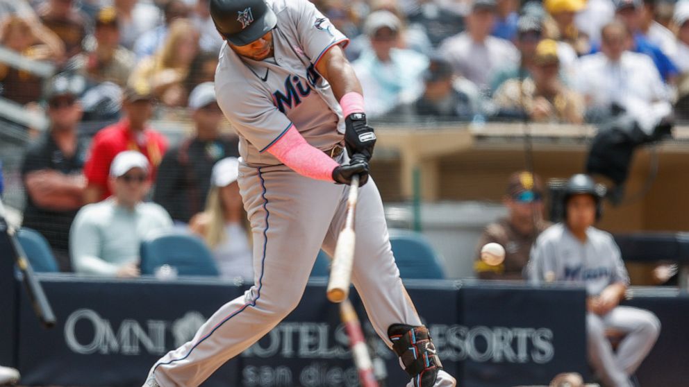 Miami Marlins' Jesus Agular hits a double against the San Diego Padres during the sixth inning of a baseball game Sunday, May 8, 2022, in San Diego. (AP Photo/Mike McGinnis)