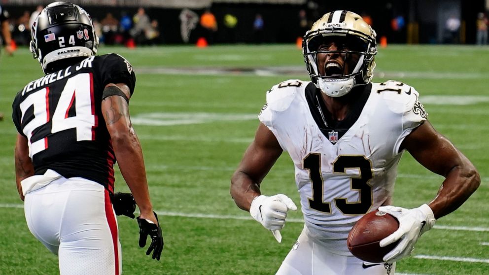 New Orleans Saints wide receiver Michael Thomas (13) celebrates his touchdown catch against Atlanta Falcons cornerback A.J. Terrell (24) during the second half of an NFL football game, Sunday, Sept. 11, 2022, in Atlanta. (AP Photo/Brynn Anderson)